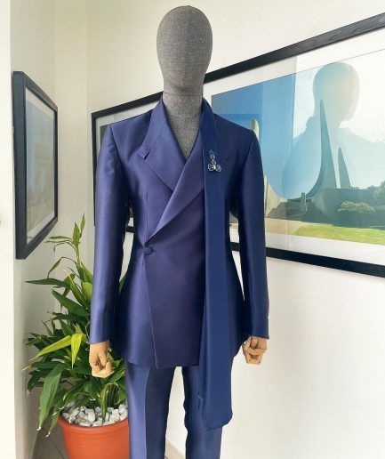 A Mikado Silk “rumble in jungle”, wrap Notch lapel, slant sache blazer suit.