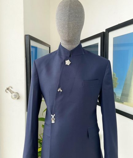 A Navy blue “parabellum”, wrap notch lapel blazer suit