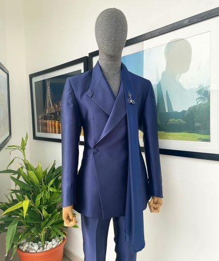 A Mikado Silk “rumble in jungle”, wrap Notch lapel, slant sache blazer suit.