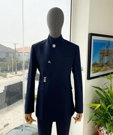 A Navy blue “parabellum”, wrap notch lapel blazer suit