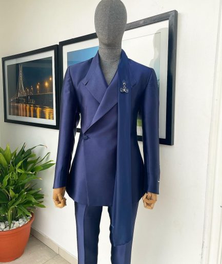 A Mikado Silk “rumble in jungle”, wrap Notch lapel, slant sache blazer suit.