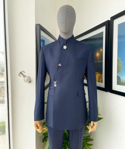 A Navy blue “parabellum”, wrap notch lapel blazer suit