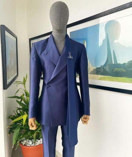 A Mikado Silk “rumble in jungle”, wrap Notch lapel, slant sache blazer suit.