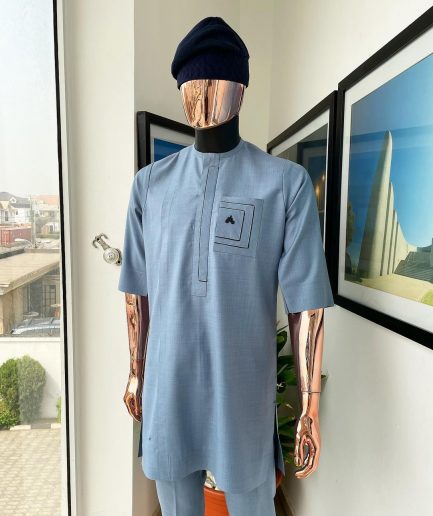 A Carolina blue, layered rectangle and square embroidery flap and pocket detailing african traditional senator kaftan native.