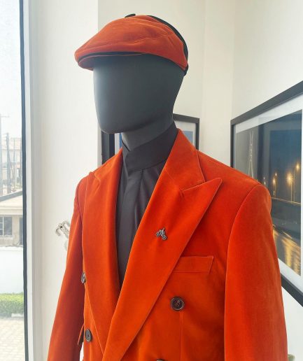 A vermillion Orange, soaked Italian velvet, double breasted, Lower Cut suit