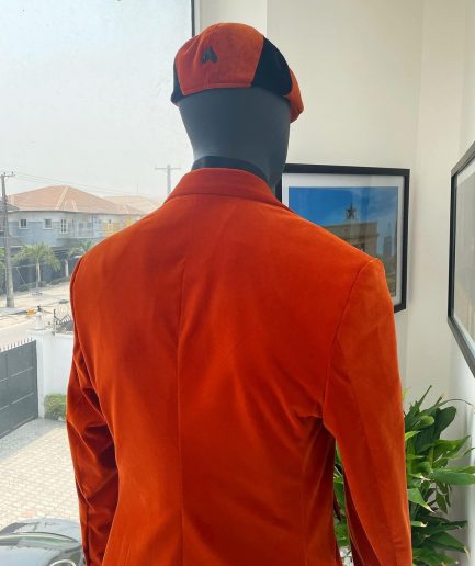 A vermillion Orange, soaked Italian velvet, double breasted, Lower Cut suit