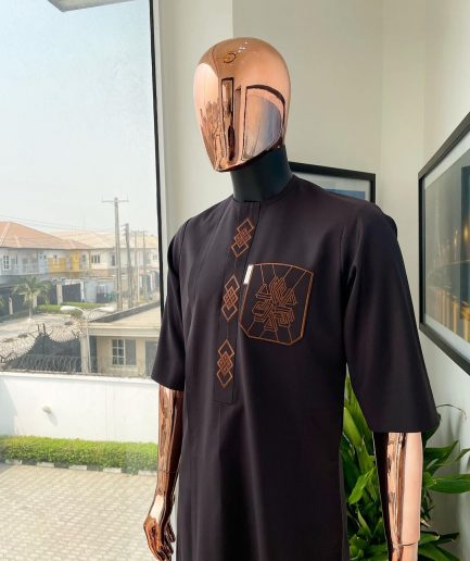 An umber brown, 3D precision anchor embroidery flap and pocket detailing African traditional senator Kaftan native