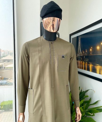 A Tortilla brown, black Swarovski button with purple paisley detailing with side patch pocket african traditional senator kaftan native.