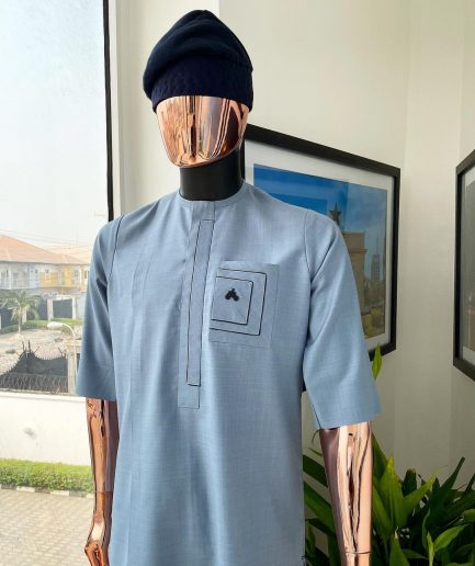 A Carolina blue, layered rectangle and square embroidery flap and pocket detailing african traditional senator kaftan native.