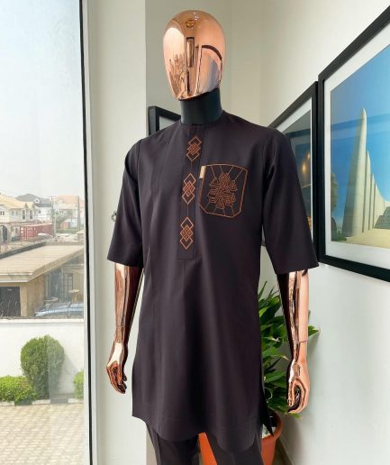 An umber brown, 3D precision anchor embroidery flap and pocket detailing African traditional senator Kaftan native