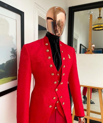 An “empire” candy red, floral patterned metallic jacquard suit