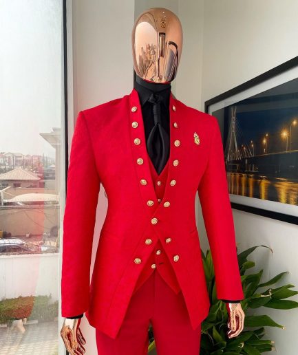 An “empire” candy red, floral patterned metallic jacquard suit