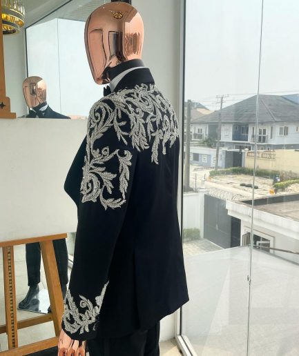 The “Trailblazers” charcoal black, shawl lapel tuxedo suit with metallic silver adornments