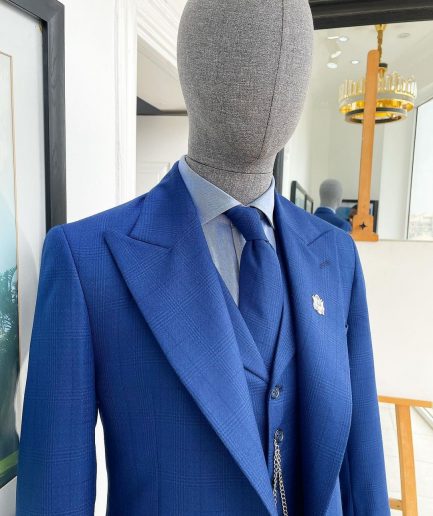 A glen plaid check, lapis blue - nobility - “Board Room” peak lapel suit