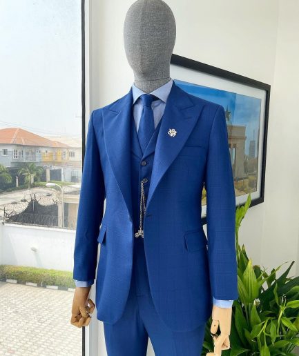 A glen plaid check, lapis blue - nobility - “Board Room” peak lapel suit