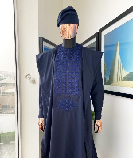 A Navy blue, connected square embroidery design with matching Skye blue Swarovski stone details agbada