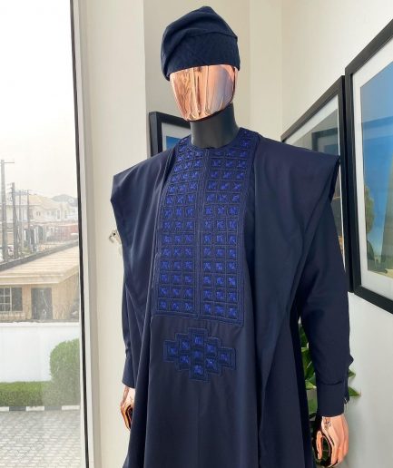 A Navy blue, connected square embroidery design with matching Skye blue Swarovski stone details agbada