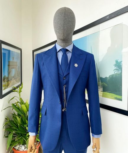 A glen plaid check, lapis blue - nobility - “Board Room” peak lapel suit