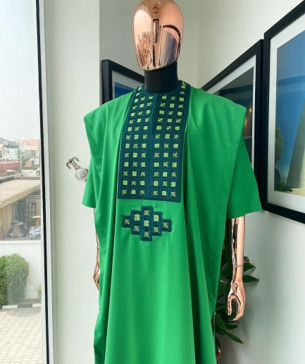 A Shamrock green, connected square embroidery design with matching silver and parakeet green Swarovski stone details agbada