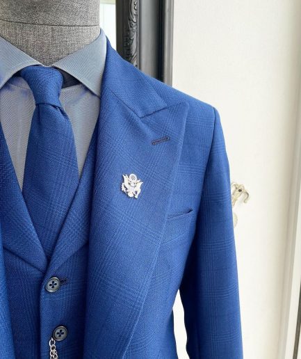 A glen plaid check, lapis blue - nobility - “Board Room” peak lapel suit