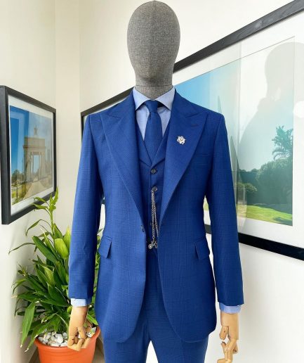 A glen plaid check, lapis blue - nobility - “Board Room” peak lapel suit