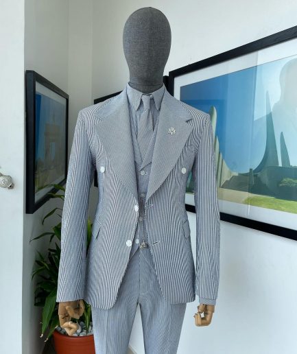 A monochrome seersucker (rail road stripe) notch lapel suit