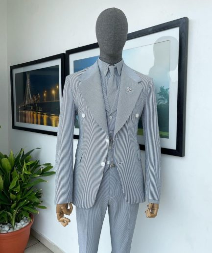 A monochrome seersucker (rail road stripe) notch lapel suit