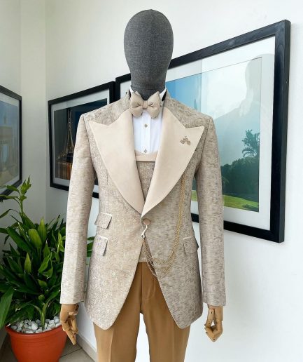 A splash of tortilla and wheat brown peak lapel metallic jacquard tuxedo suit