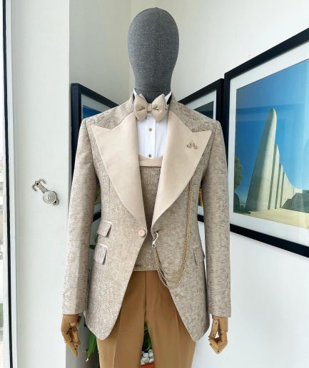 A splash of tortilla and wheat brown peak lapel metallic jacquard tuxedo suit