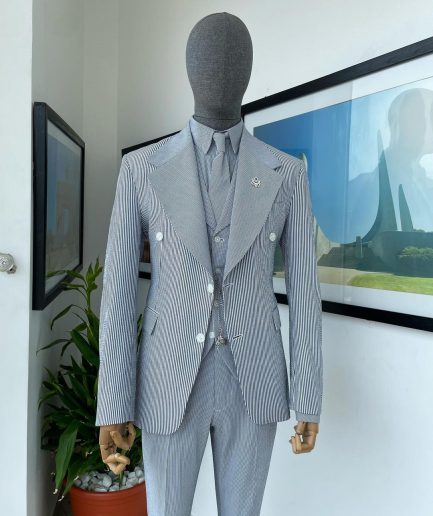 A monochrome seersucker (rail road stripe) notch lapel suit