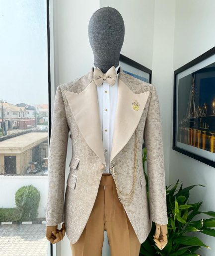 A splash of tortilla and wheat brown peak lapel metallic jacquard tuxedo suit