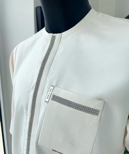 An Ivory white, Swarovski Clear Crystal Trim bling flap and pocket detailing, African traditional senator kaftan native.
