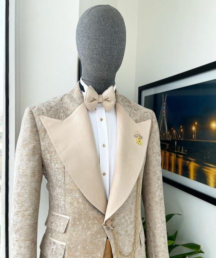 A splash of tortilla and wheat brown peak lapel metallic jacquard tuxedo suit