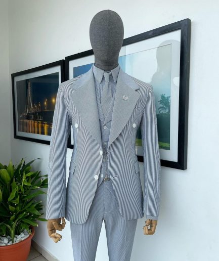 A monochrome seersucker (rail road stripe) notch lapel suit