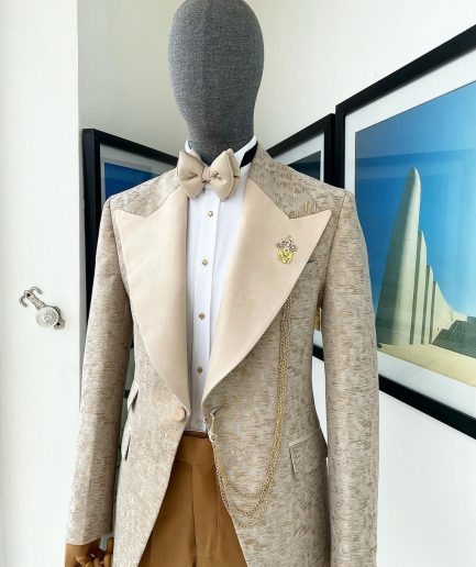 A splash of tortilla and wheat brown peak lapel metallic jacquard tuxedo suit
