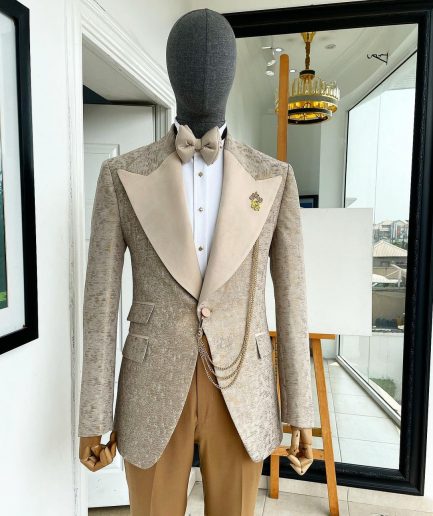 A splash of tortilla and wheat brown peak lapel metallic jacquard tuxedo suit