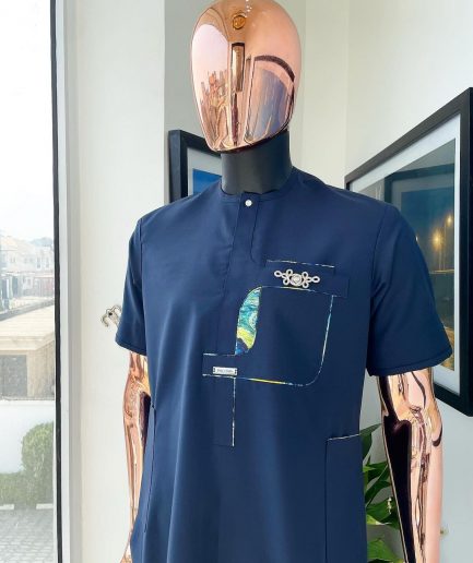 A Navy blue, multileg intersection pocket with clear view flap Swarovski button detailing african traditional senator kaftan native.