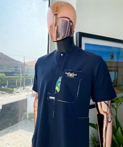 A Navy blue, multileg intersection pocket with clear view flap Swarovski button detailing african traditional senator kaftan native.