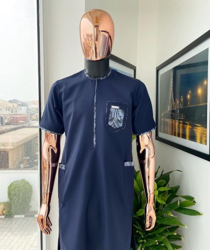 A Midnight blue, Skye blue, and black cloud pattern metallic Jacquard flap and pocket detailing African traditional senator kaftan native