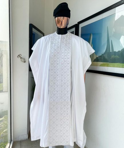 A white, connected square embroidery design with matching silver and black Swarovski stone details agbada