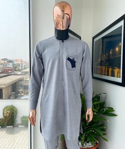 A Baba blue, gun-detailed patch pocket African traditional senator kaftan native.