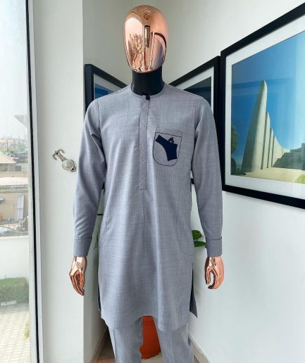 A Baba blue, gun-detailed patch pocket African traditional senator kaftan native.