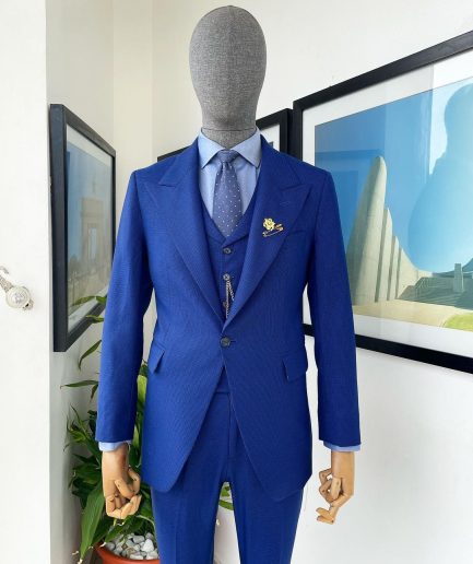 A glen plaid check, lapis blue - nobility - “Board Room” peak lapel suit