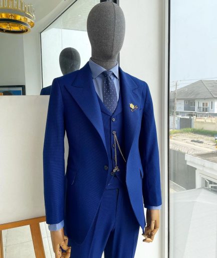 A glen plaid check, lapis blue - nobility - “Board Room” peak lapel suit