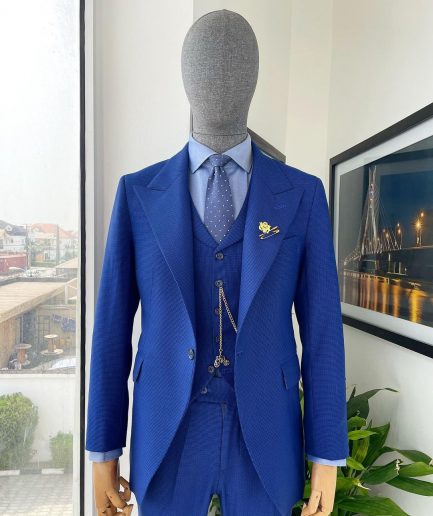 A glen plaid check, lapis blue - nobility - “Board Room” peak lapel suit