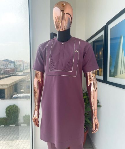A plum purple double rectangle with ruffles and Swarovski buttons detailing African traditional senator Kaftan native.
