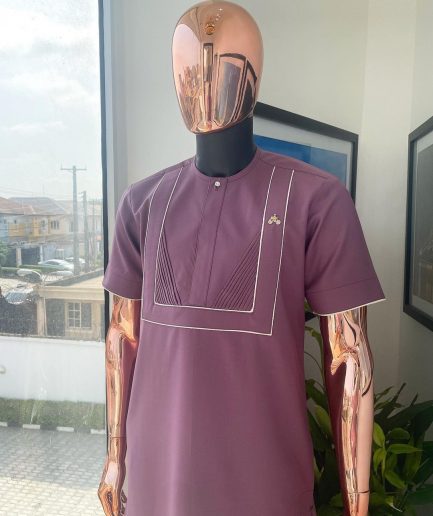A plum purple double rectangle with ruffles and Swarovski buttons detailing African traditional senator Kaftan native.