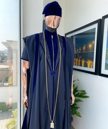 A Midnight blue, vehicular lapelled with zip line flap & navy blue soaked Italian velvet mix embroidery design details agbada