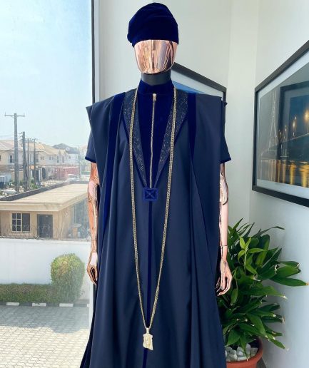 A Midnight blue, vehicular lapelled with zip line flap & navy blue soaked Italian velvet mix embroidery design details agbada