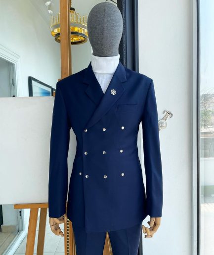 An Navy blue “ibiza” wrap suit with snap buttons detailing